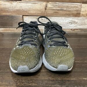 Nike Air Zoom Structure running shoe in a black, white, dark grey, cool grey